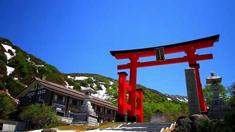 Tohoku Tourism Promotion Organization The trek begins at the red torii that marks the entrance to sacred ground (Credit: Tohoku Tourism Promotion Organization)