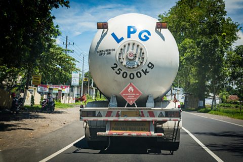 Large transport truck with flammable symbol