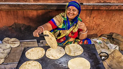 Hadnyah/Getty Images Many Indians prefer to buy from local businesses and street vendors (Credit: Hadnyah/Getty Images)