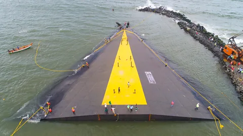 NCCR/NIOT The artificial reef, shaped like a pizza slice, was constructed at the shore before being towed to its resting place (Credit: NCCR/NIOT)