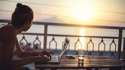 Getty Being able to travel and work remotely in a different city or country is a privilege, which is why widespread digital nomadism is inaccessible to all, experts say (Credit: Getty)