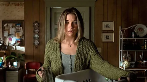 AMC Kevin Can… shifts between traditional domestic sitcom scenes and the reality of Allison's life (Credit: AMC)