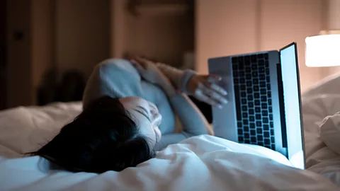 Getty Images Technology has played a major part in allowing our work lives to fuse with our personal lives (Credit: Getty Images)