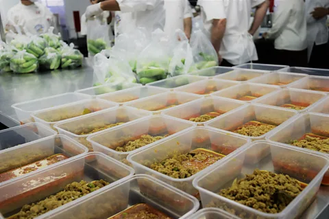Almond Group Meng and a team of chefs recently cooked 410 boxes of prahok ktis for workers affected by the pandemic (Credit: Almond Group)