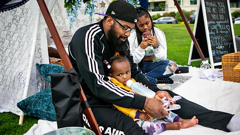 Jason Armond/LA Times/Getty Images Although humans fathers are unusual among animals, fatherhood can also vary greatly among humans too (Credit: Jason Armond/LA Times/Getty Images)