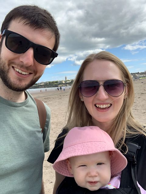 Alex with her partner Blair and daughter Ada.