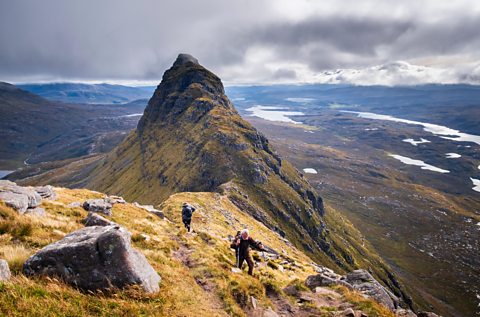 Two climbers on mountain ridge