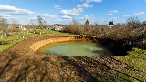 Antonio Bronic/Reuters/Alamy The hole that opened up in Nikola Borojević's garden was more than 30m (98ft) wide and 15m (49ft) deep (Credit: Antonio Bronic/Reuters/Alamy)