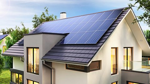 Solar panels on the roof of a modern house