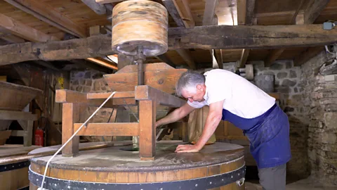 Anna Muckerman Gerard Lhuillier makes flour from a water mill that was constructed around 1741 (Credit: Anna Muckerman)