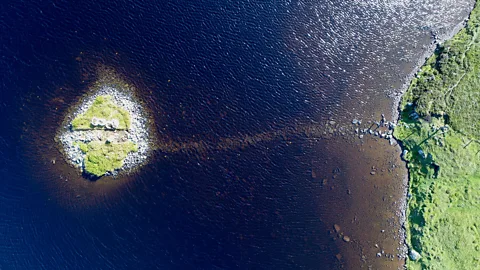 Fraser Sturt Aerial views of the crannogs show how these ancient settlements were once joined to the shore (Credit: Fraser Sturt)