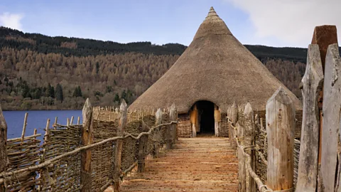 Peter Carroll/Alamy People are thought to have dwelled on Scotland's crannogs for thousands of years – although no one knows exactly why they were built (Credit: Peter Carroll/Alamy)