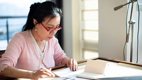 Getty Prizing productivity over presenteeism might reduce the pressures that lead to ya miao, experts say (Credit: Getty)