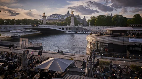 Kiran Ridley/Getty Images Paris is beginning to resemble its former self once more as cafes and restaurants reopen and diners return in person (Credit: Kiran Ridley/Getty Images)