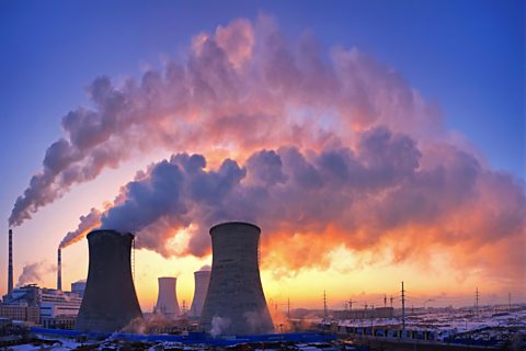 Power station emitting gas into sky