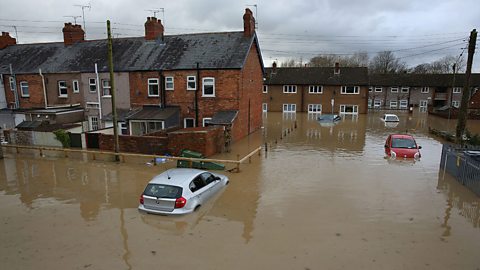 A flooded street in the UK.