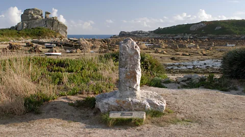 Michael Grant/Alamy A stone memorial marks where Sir Cloudesley Shovell's body was washed up from the wreck of HMS Association (Credit: Michael Grant/Alamy)