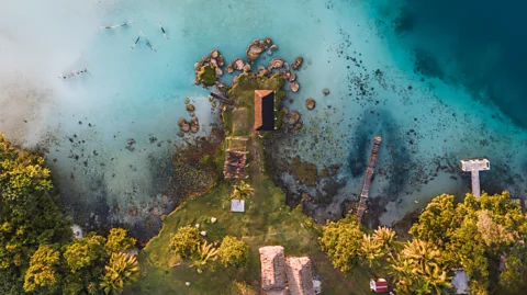Marco Bottigelli/Getty Images Lake Bacalar is known as the "Lake of Seven Colours" due to its vibrant thalassic hues (Credit: Marco Bottigelli/Getty Images)