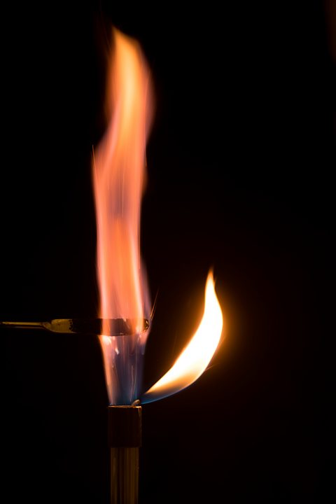 Potassium burning in air with lilac flame.