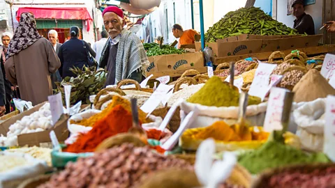 dbimages/Alamy Mohammed Bennani buys vegetables for his couscous at Tunis' Marche Centrale (Credit: dbimages/Alamy)