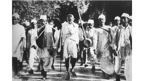 Alamy In protest against the salt taxes, Gandhi and his followers marched 241 miles (388km) across Gujarat in 1930 (Credit: Alamy)