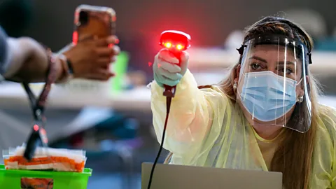 Irfan Khan/LA Times/Getty Images Technology such as mobile phone apps and digital scanners have helped to make Covid-19 testing more efficient during the pandemic (Credit: Irfan Khan/LA Times/Getty Images)