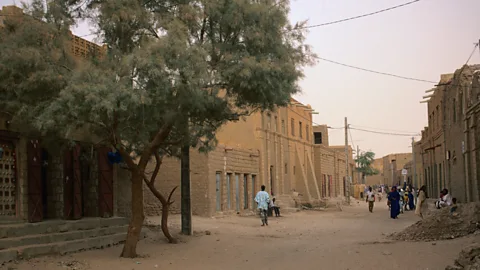 John Elk/Getty Images Now a dusty and ramshackle city, Timbuktu once stood at the confluence of some of Africa's most lucrative trade routes (Credit: John Elk/Getty Images)