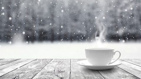 Hot cup of coffee on a cold day