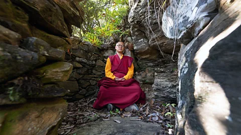 Scott A Woodward Rinpoche frequently visits his personal meditation cave in the forested hills behind the Sangchen Ogyen Tsuklag Monastery in Trongsa (Credit: Scott A Woodward)
