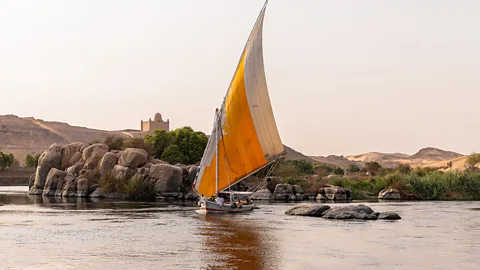 Mai Farouk Sailboats pass over the shimmering Nile river (Credit: Mai Farouk)