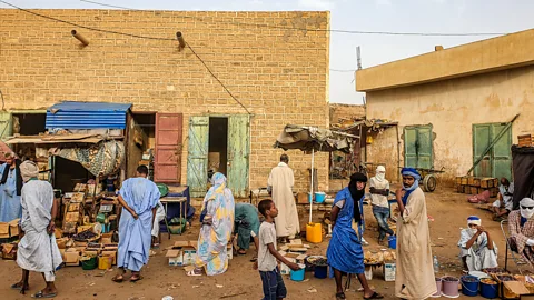 Juan Martinez Today, people wear light blue daraas for their similarity to traditional white daraas (Credit: Juan Martinez)