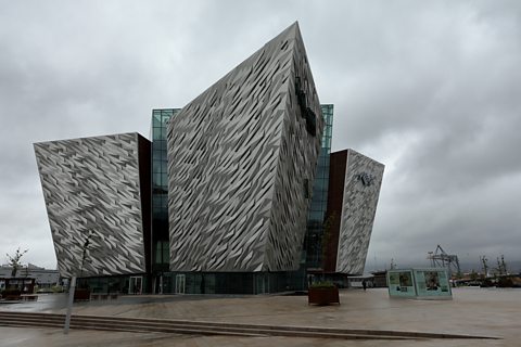 photograph of the Titanic Belfast building on a rainy, overcast day.