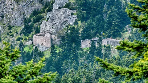 Dimitrios Tilis/Getty Images The 16th-Century Holy Monastery of Panagia Pelekiti is built into a cliff face in the Agrafa mountains (Credit: Dimitrios Tilis/Getty Images)