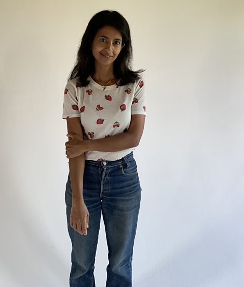 A picture of Konnie Huq standing against a white background. 