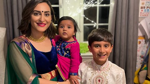 A mother with her son and daughter Ellora celebrating Diwali 