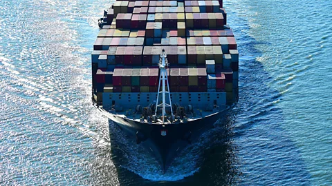 Johannes Eisele/Getty Images Emissions from international shipping and aviation are something of a grey area in countries' pledges to reach net zero (Credit: Johannes Eisele/Getty Images)