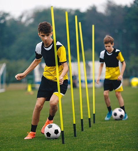 2 boys at football training