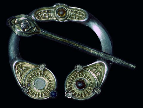 A silver Pictish brooch used to fasten clothing such as cloaks and capes.