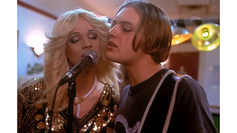 Getty Images Mitchell with Michael Pitt, who played Tommy Gnosis (Credit: Getty Images)