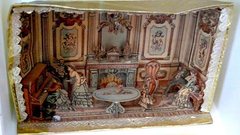 An example of a paper doll's house that would have been a Christmas present in the 19th Century