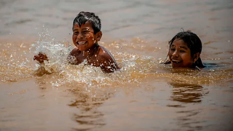 Getty Images Children all over the world form close relationships, either with friends or extended family (Credit: Getty Images)