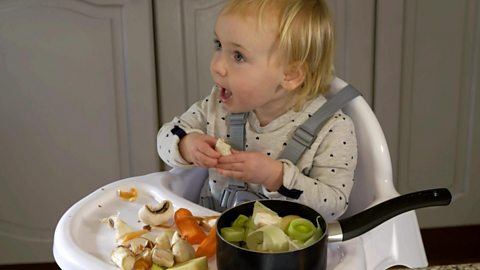 Child playing with food