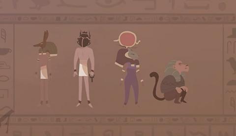 Four ancient Egyptian gods on a wall.