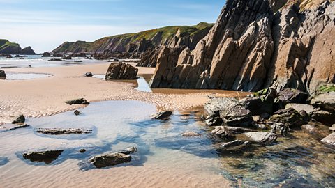 Rock pools on a beach in west Wales.