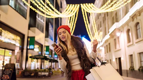 Getty Images Even when US workers do manage to take holiday, many report working or answering messages while they're away (Credit: Getty Images)
