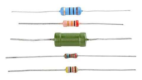 A photo of five resistors which are different shapes and sizes