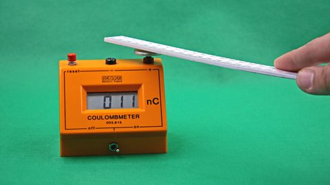 A coulombmeter showing a 0.11 charge