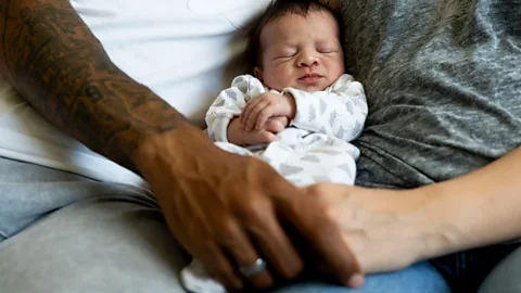 Getty Images Financial instability, the changing climate and political unrest are causing many parents to rethink how many children they may have (Credit: Getty Images)