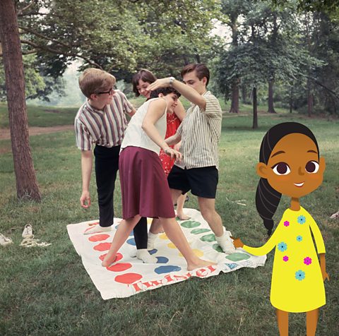 A group of friends playing a game that became popular in the 1960s.