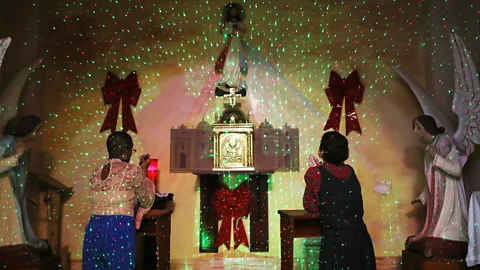 Mario Tama/Getty Images Many churches in Puerto Rico used emergency generators to hold a "midnight mass" on Christmas Eve in the wake of the 2017 hurricane (Credit: Mario Tama/Getty Images)